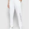 ΧΟΝΔΡΙΚΟ ΕΜΠΟΡΙΟ ⌛ Lacoste Γυναίκες Παντελόνια Φόρμας Παντελόνι φόρμας XF0205 Λευκό Regular Fit ❤️